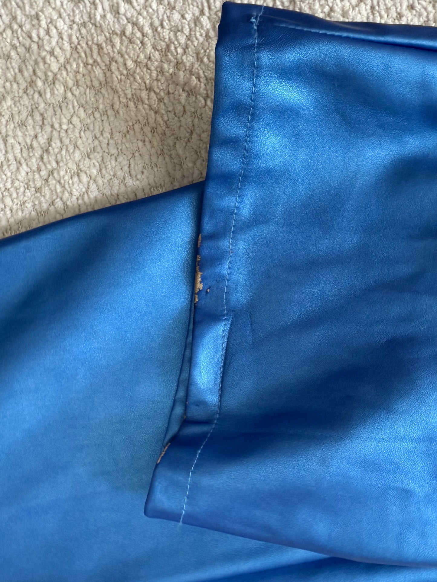 Pantalones metálicos azules (tiene defectitos)