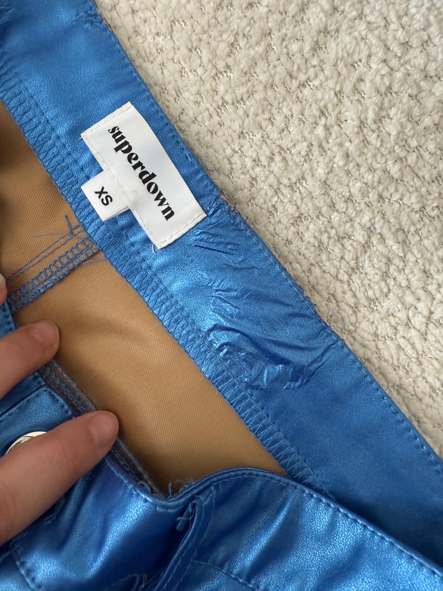 Pantalones metálicos azules (tiene defectitos)