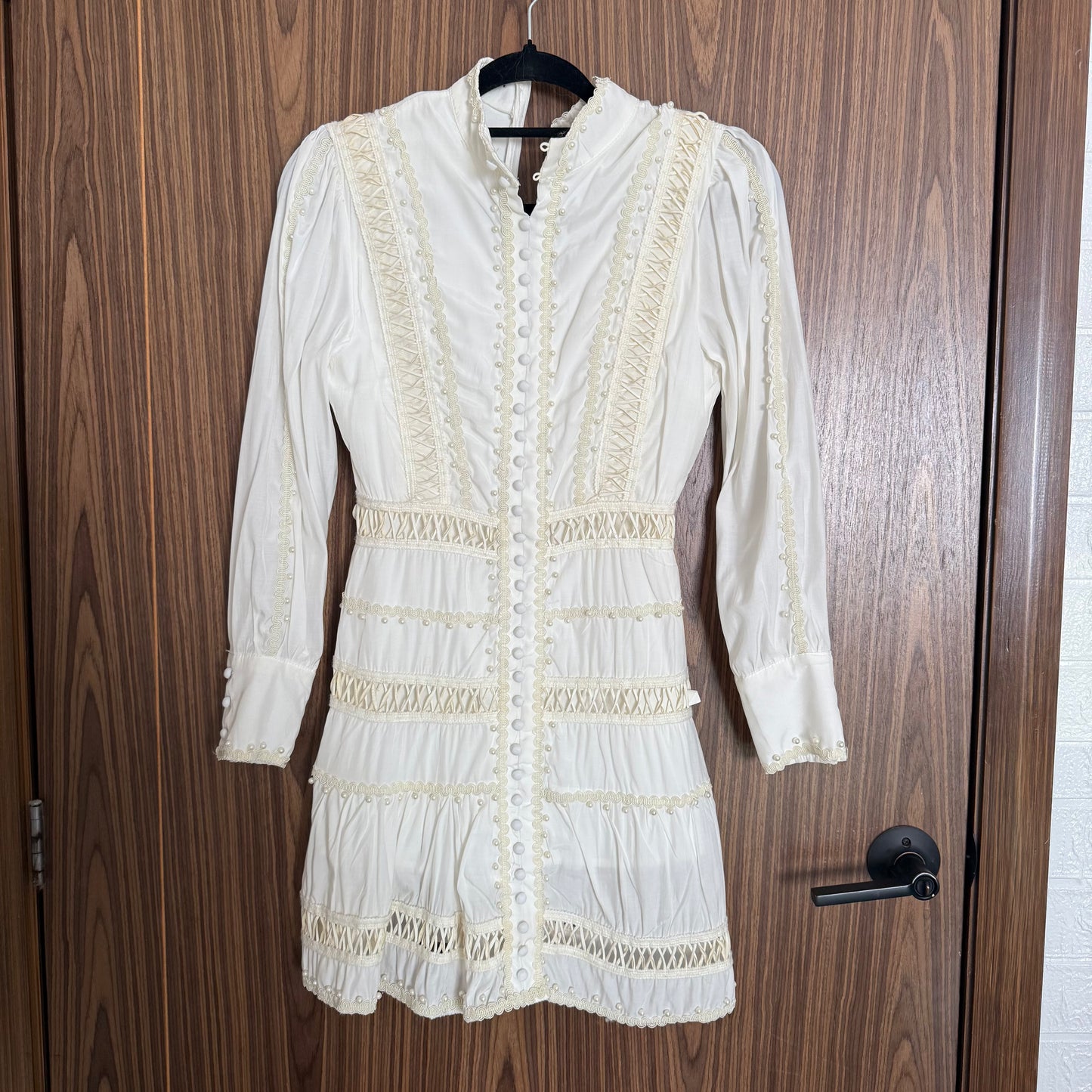 Vestido Blanco con muchos detalles