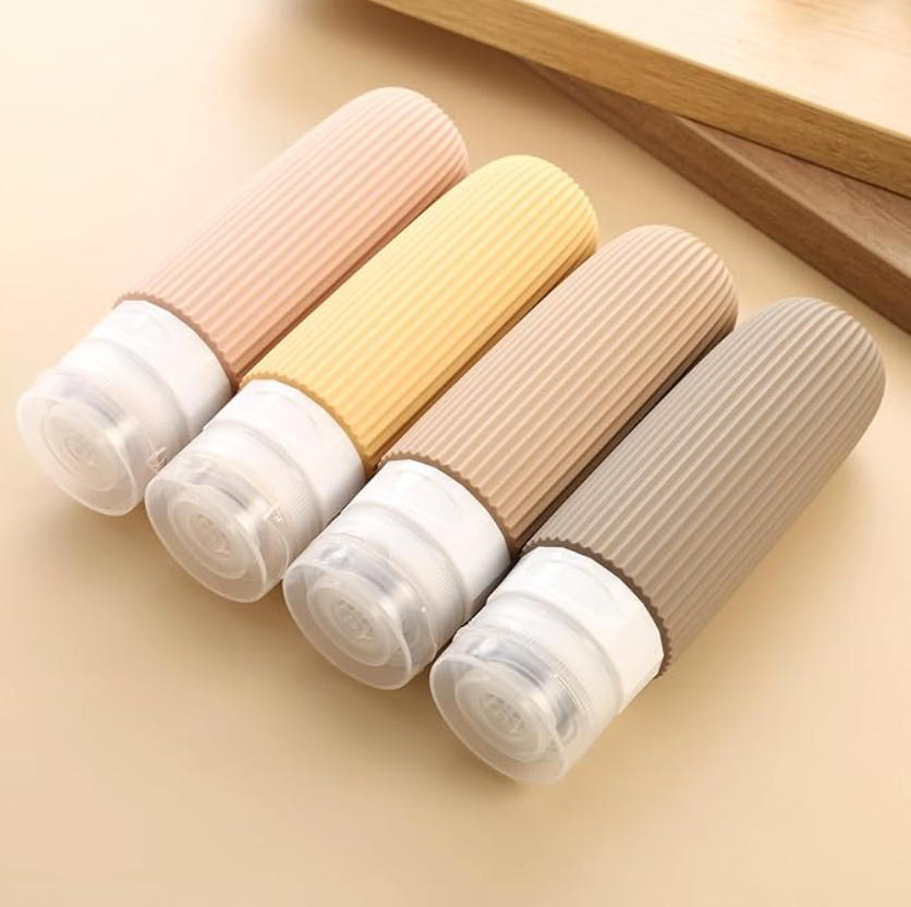 4 botes de shampoo para viaje