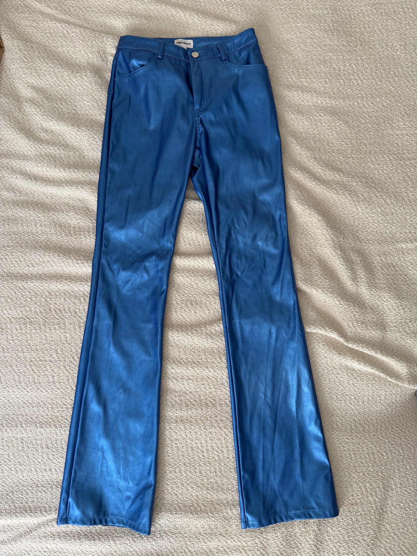 Pantalones metálicos azules (tiene defectitos)