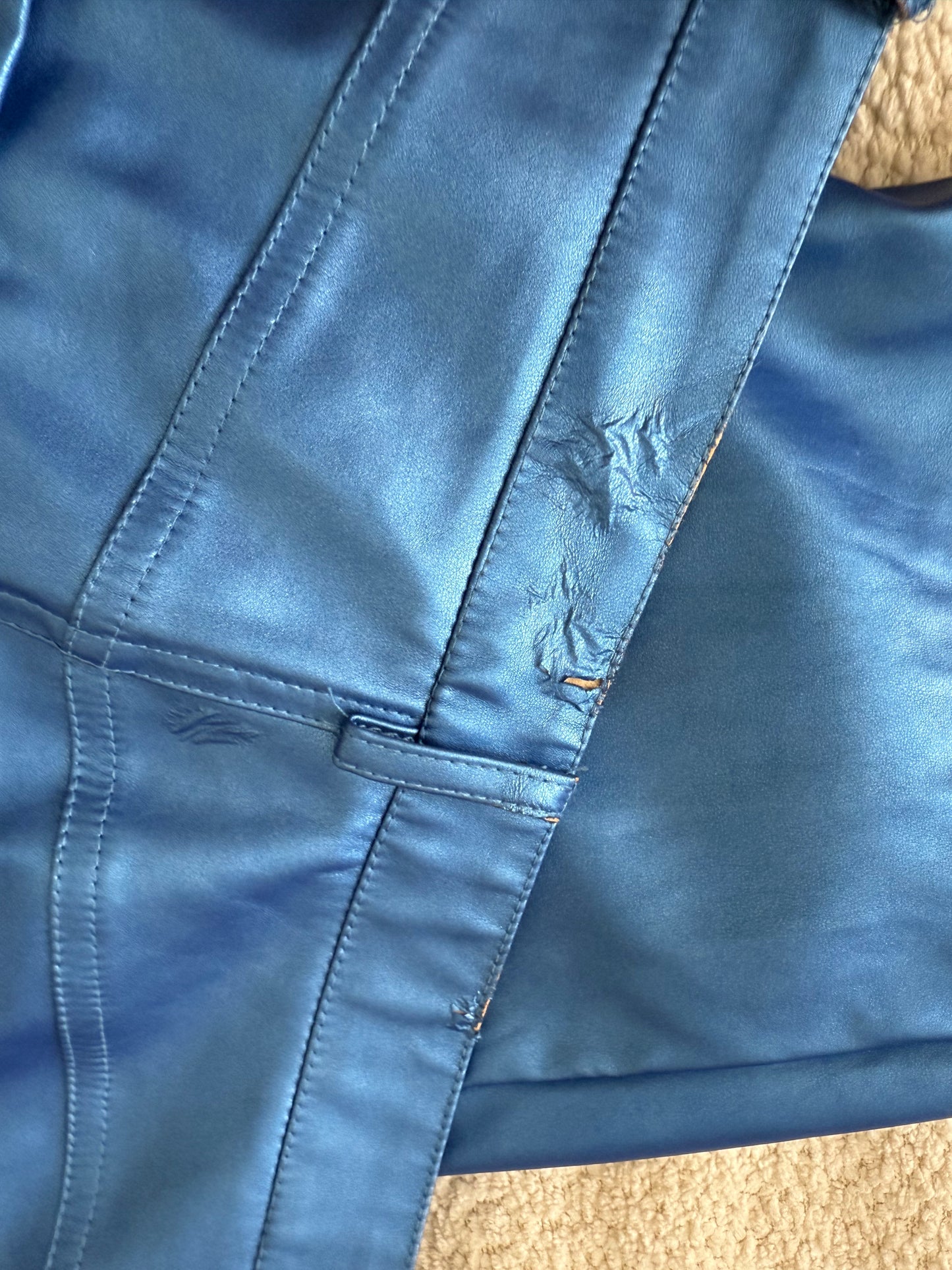 Pantalones metálicos azules (tiene defectitos)